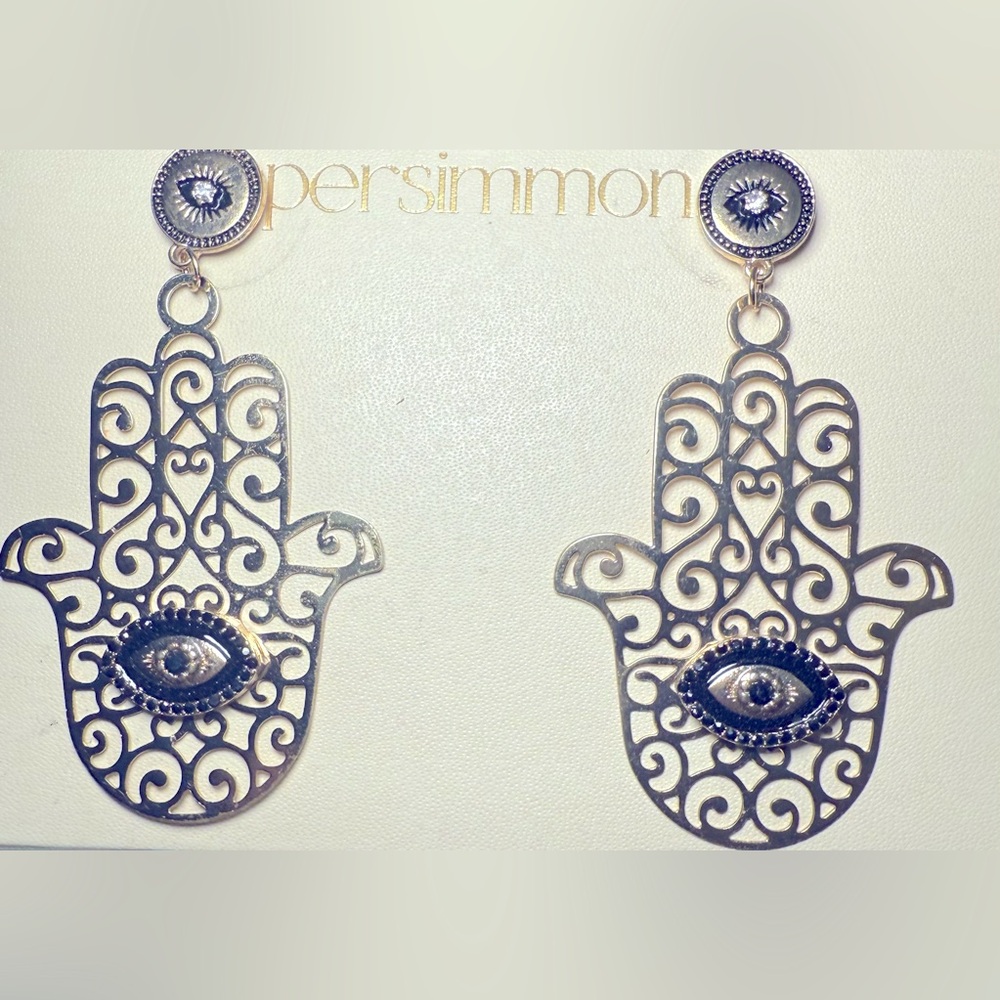 New in Box Gold-tone Hamsa earrings with the evil eye center